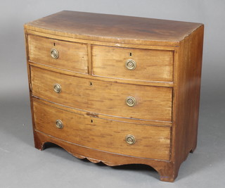 A 19th Century mahogany bow front chest of 2 short and 2 long drawers with brass ring drop handles, raised on bracket feet 30"h x 35"w x 18 1/2"d 