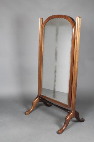 A Victorian arched plate cheval mirror contained in a mahogany swing frame 57"h x 28"w 