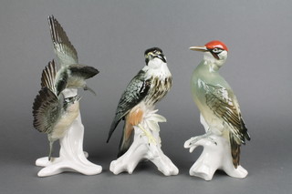 3 20th Century figures of birds on raised rustic bases 8"