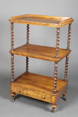 A Victorian rosewood 3 tier rectangular what-not with three-quarter gallery raised on spiral turned columns, bun feet, the base fitted a drawer 39"h x 24"w x 16"d 