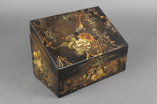 A Victorian wedged shaped lacquered stationery box with floral decoration and fitted interior and containing a small collection of postcards 6"h x 8 1/2"w x 5"d 