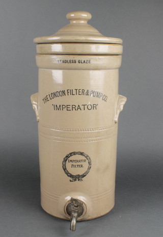 A stoneware water filter with metal tap 18" 