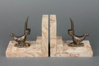 A pair of Art Deco spelter and marble bookends decorated pheasants 