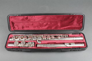 A Yamaha chromium plated flute no.211SII, cased 