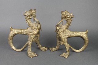 A pair of Chinese style gilt metal fire dogs in the form of walking dogs of fo, 11" 
