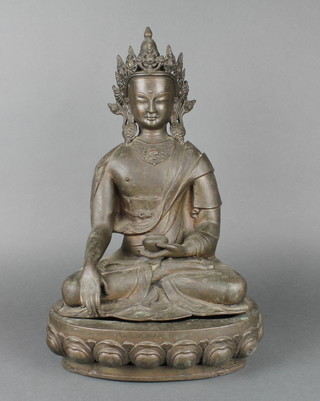 An Eastern bronze figure of a seated deity 18" 
