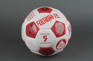 A Fulham Football Club football signed by numerous members of the team