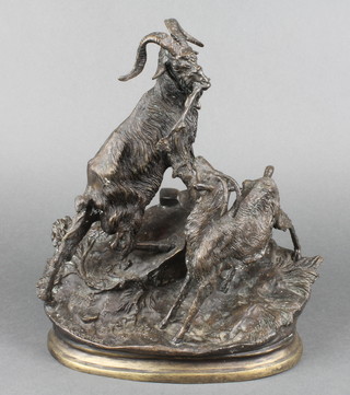 A 20th Century bronze figure group of mountain goats, raised on an oval naturalistic base 10" 