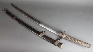 A 20th Century Wakizashi sword with 34" blade, the tang with circular anchor mark and 1 hole, contained in a lacquered scabbard 