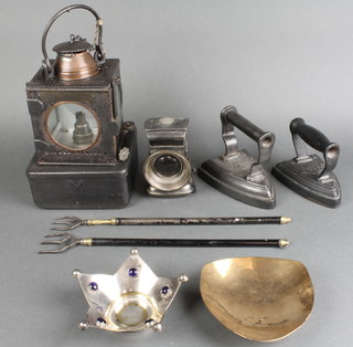 A pressed metal British Railways Eastern Welch patent lantern, a Lucas bicycle lantern, 2 flat irons, 2 brass expanding toasting forks, a shaped silver plated dish 3" and a planished brass dish 5" 