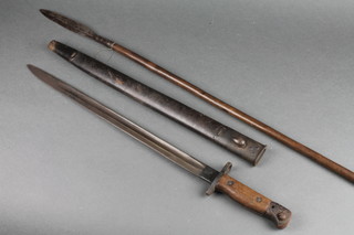 A 1907 Wilkinson patent bayonet together with a double edged spear with 6" head 