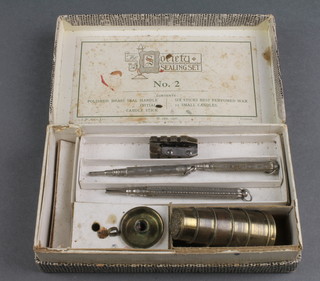 The Society Sealing set no.2, a 5 section seal case containing 5 seals (1f), a Gesetzl Geschutzt pencil sharpener and 3 propelling pencils 
