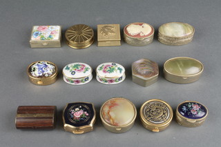 An oval wooden and brass pill box 2", 12 various gilt metal pill boxes and 2 oval porcelain pill boxes 