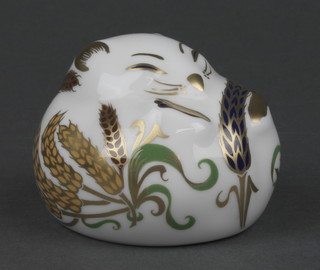 A Royal Crown Derby paperweight in the form of a sleeping dormouse, base marked LX11 2" 
