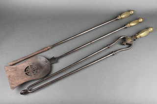 A 19th Century 3 piece polished steel and brass fireside companion set comprising poker, shovel, pair of tongs