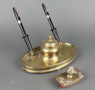A brass inkwell raised on an oval base and 4 bun feet, base marked W T & S 8" together with an embossed brass blotter 3 1/2" and 2 Sheaffer fountain pens with 14ct gold nibs 