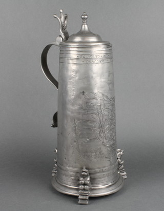 An impressive 19th Century German engraved pewter stein with crown thumb piece  decorated the scene of St George slaying a dragon outside a city and with coat of arms marked S F 1653, engraved Georgivs XPI Miles Dranonem Imerficit Et Regis Filiam Liberat 14" 
