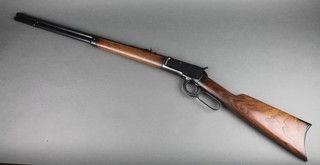 An 1884 patent 1892 Winchester rifle with walnut stock and de-activation certificate 
