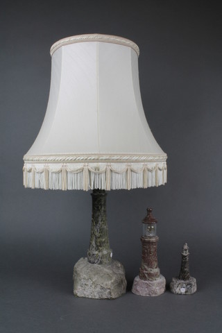 A serpentine table lamp in the form of a light house 11" 1 other 7" and 1 other 4" 