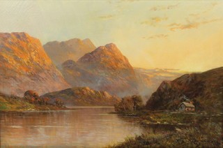 F C Jamieson, oil on canvas, a Scottish loch scene at sun set with cottage and distant mountains, signed 15 3/4" x 23 1/2" 