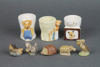 3 novelty egg cups and 5 Wade Whimsies