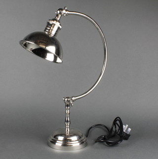 A nickel plated desk lamp on a circular base 18" 