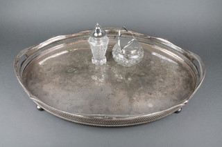 An oval silver plated galleried tray, 2 other items