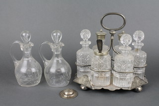 An Edwardian silver plated 6 bottle cruet and 2 other items 