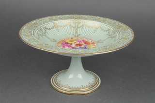 A Royal Worcester tazza, the turquoise ground decorated with gilt floral swags and flowers 8" 