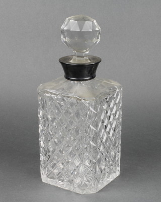 A cut glass square spirit decanter with silver collar, Birmingham 1975 10" 