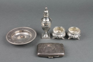 A silver Armada dish, London 1981, 4", a pepperette, pair of salts and cigarette case