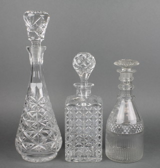 An early 19th Century mallet shaped decanter and stopper with hobnail decoration and 2 others