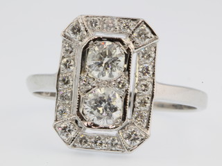 An 18ct white gold Art Deco style diamond set ring, approx 0.8ct, size N 1/2 