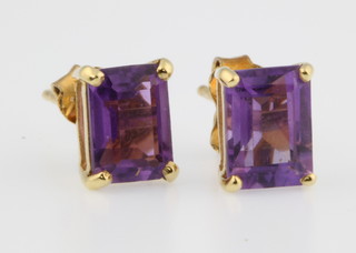 A pair of 18ct yellow gold amethyst ear studs