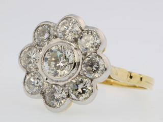A yellow gold diamond cluster ring, approx. 2.1ct size N