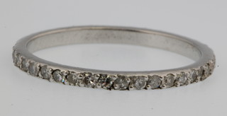 A white gold 38 stone diamond eternity ring, approx. 0.45ct size L