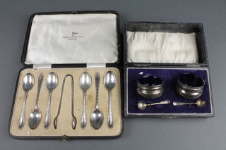 A set of cased silver teaspoons and nips, Sheffield 1928, a cased 2 piece condiment set 132 grams
