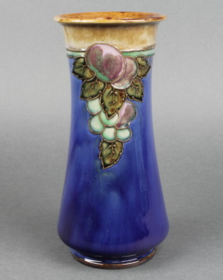 A Doulton Lambeth waisted blue ground vase decorated with fruits 8" 
