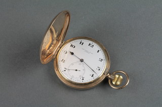 A gentleman's 9ct gold hunter pocket watch with seconds at 6 o'clock 