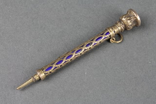 A Victorian gilt and enamelled propelling pencil with hardstone end