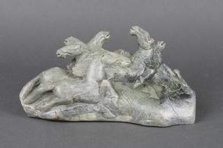 A carved soapstone group of horses 9"