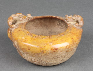 A carved soapstone pot decorated with dragons and having mythical beast handles 5 1/2