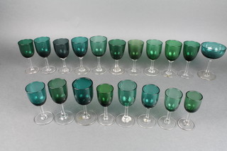 A collection of 19 Victorian green glass wines