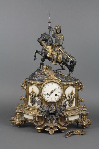 A Victorian French 8 day striking figural mantel clock with enamelled dial and Roman numerals, contained in a gilt metal case surmounted by a figure of a crusader on horse back with pennant and above various military trophies 22 1/2"h x 