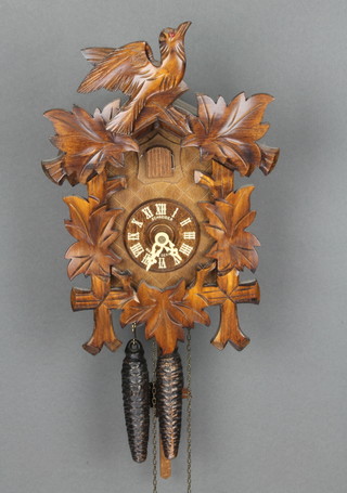 Schneider, a German cuckoo clock complete with weights 