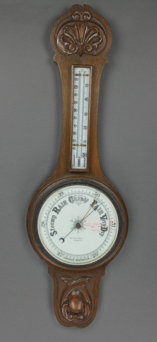 Itchison, an aneroid barometer and thermometer contained in an oak wheel case 