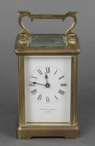 A 19th Century French 8 day carriage timepiece with enamelled dial and Roman numerals contained in a gilt metal case, the dial marked Johnson and Sons of Derby