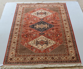 A Belgian cotton peach ground Caucasian style rug with 3 diamonds to the centre 86" x 63" 