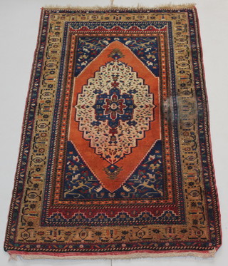 A contemporary brown ground Persian rug with diamond medallion to the centre with multi-row borders 83"h x 48 1/2"w 