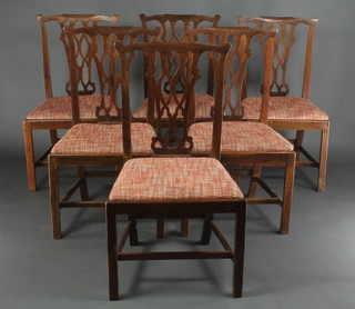 A set of 6 19th Century mahogany Chippendale style slat back dining chairs with upholstered drop in seats, raised on square supports 
